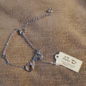 Para Ti handcuff and key bracelet